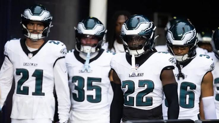 Eagles players walk out to the field