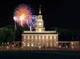 Independence Hall at night with fireworks