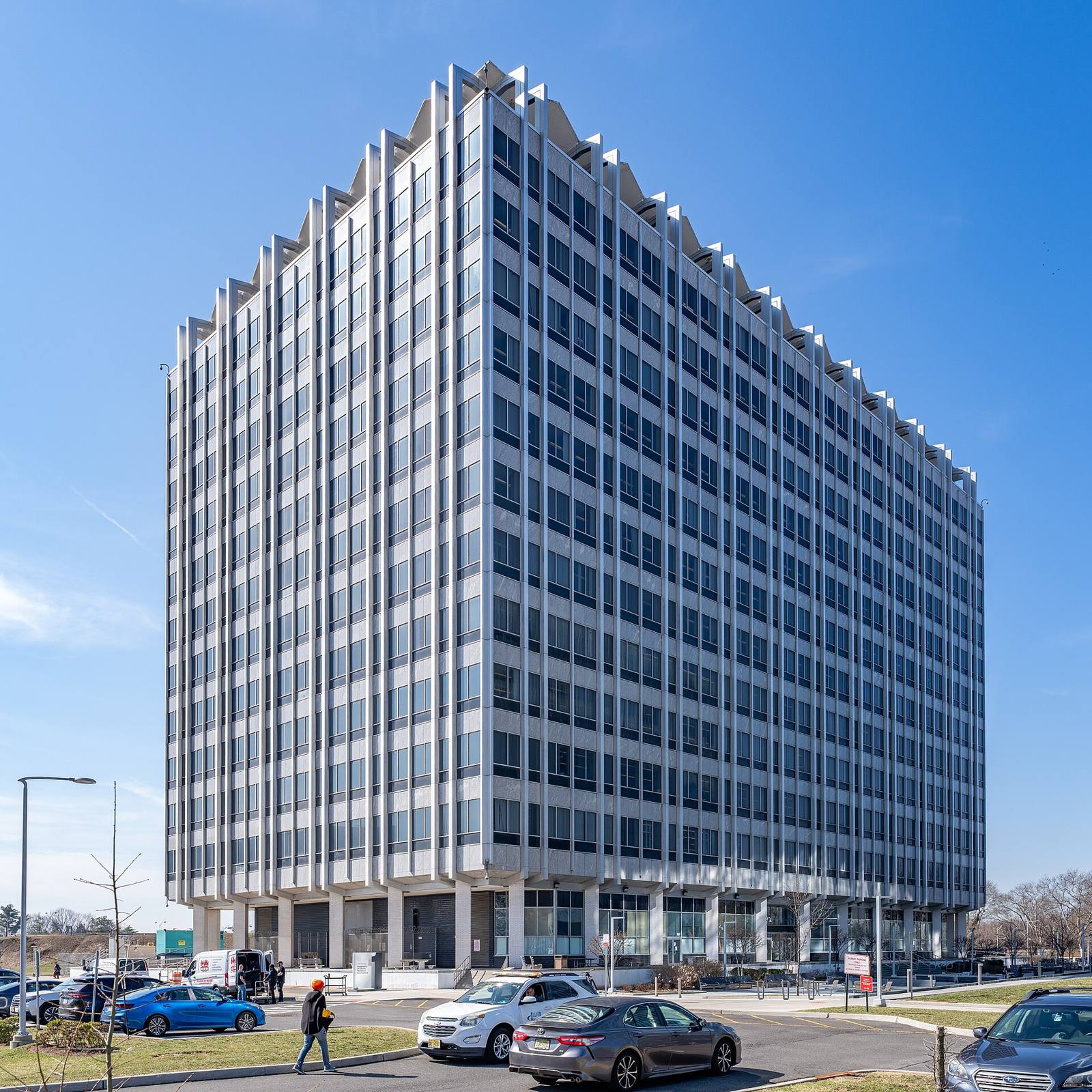 A tall glass and aluminum office tower, the New Jersey Department of Labor and Workforce Development building in Trenton