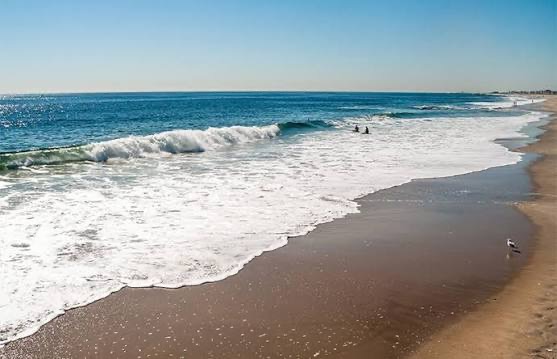 Waves rolling onto a South Jersey beach in summer
