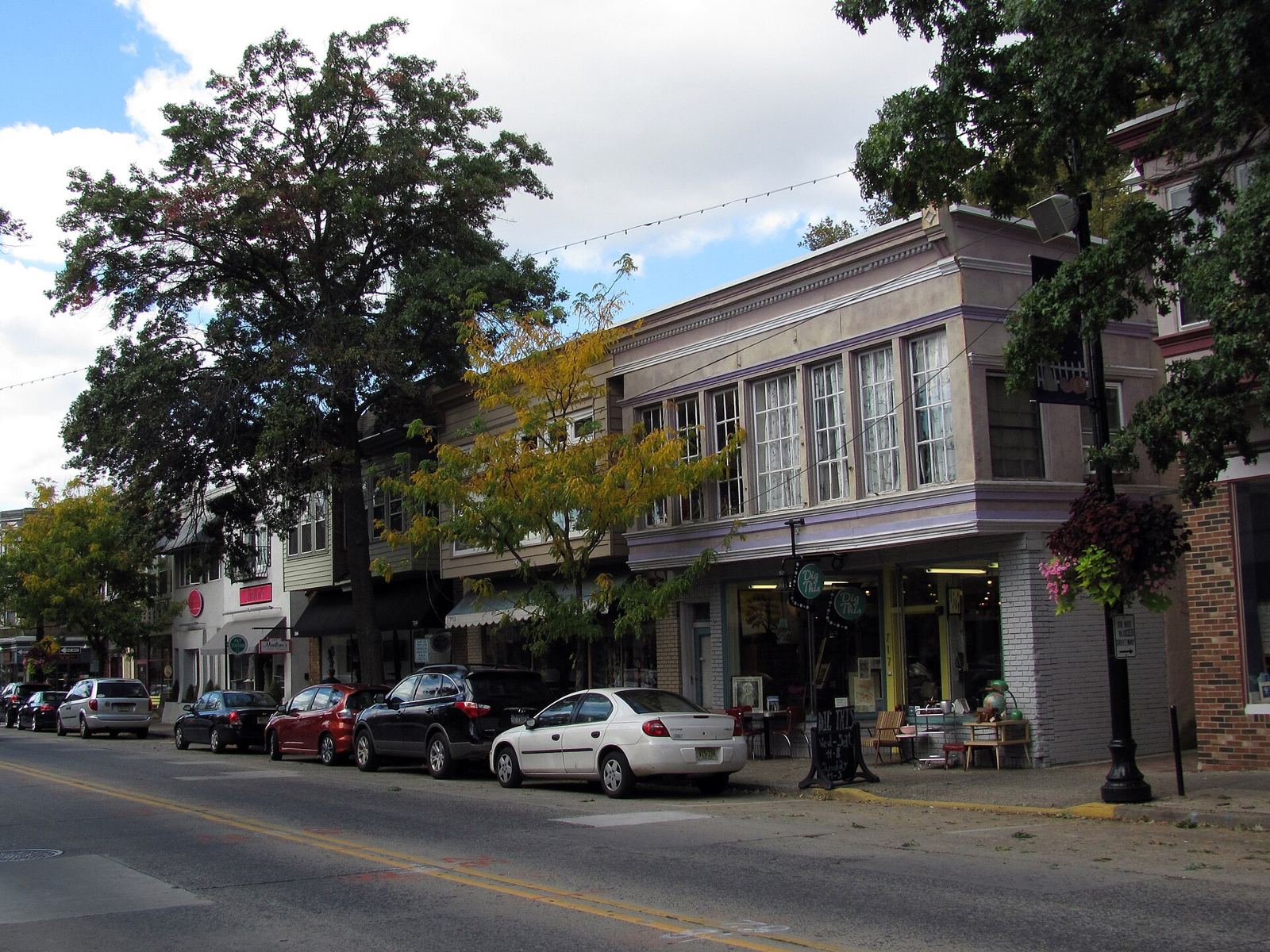 Shops and early fall trees along Haddon Avenue in downtown Collingswood