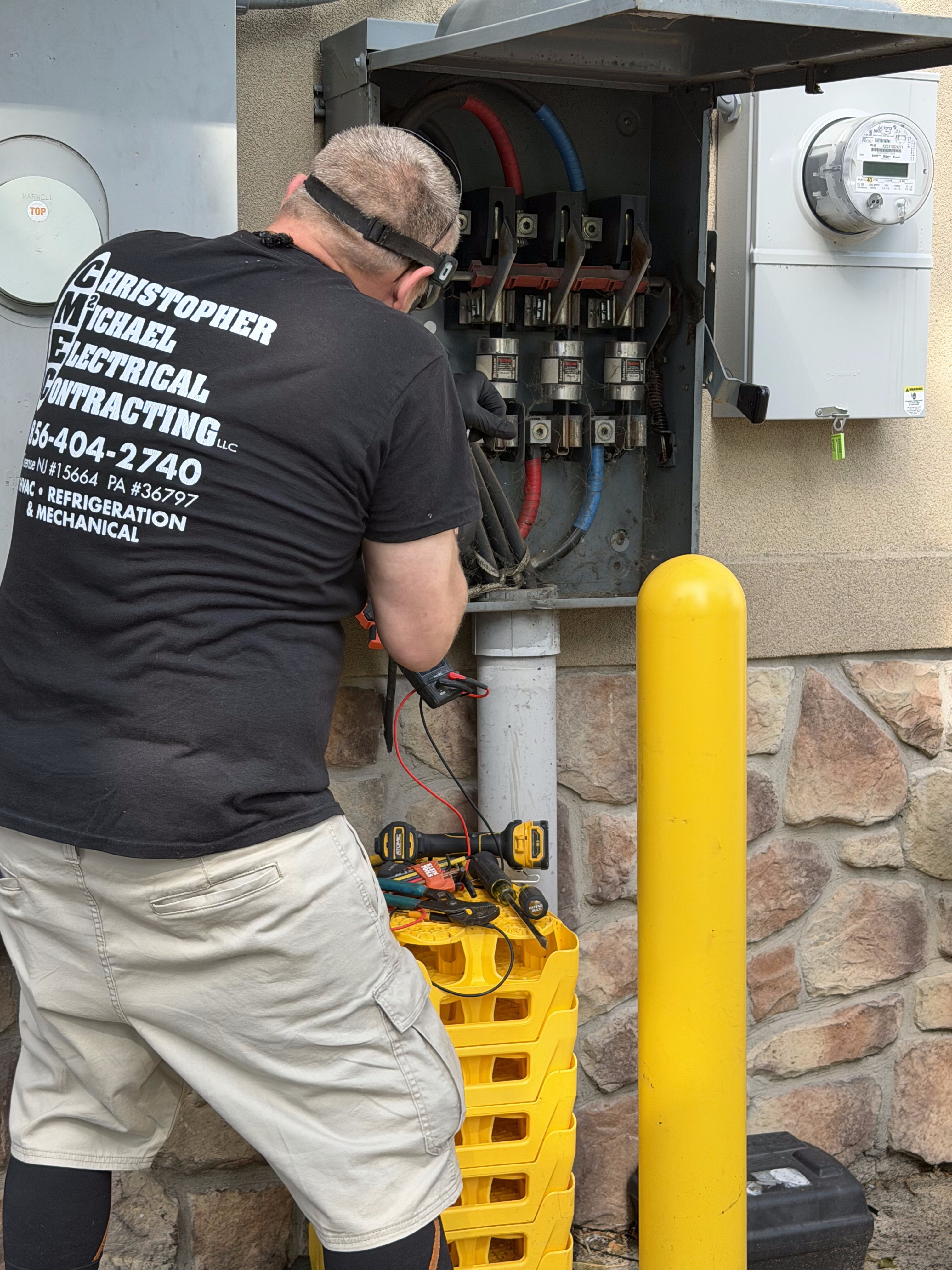 Chris Borsello CMEC working on electrical panel — South Jersey