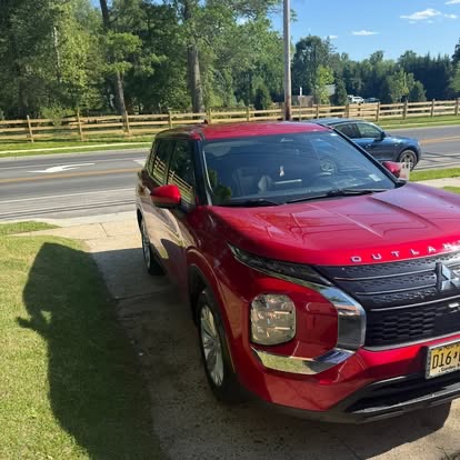 Red Mitsubishi Outlander after full detail — TCB Auto Detailing South Jersey