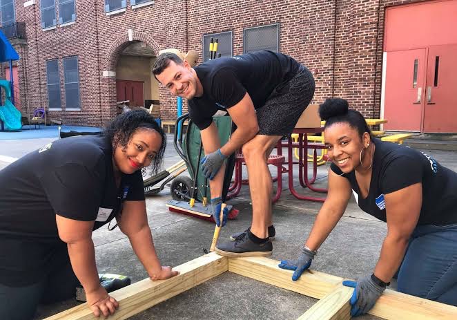 Volunteers with the Volunteer Center of South Jersey pitch in on a community build